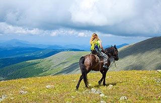 Scoprire la Valtellina in sella a un cavallo